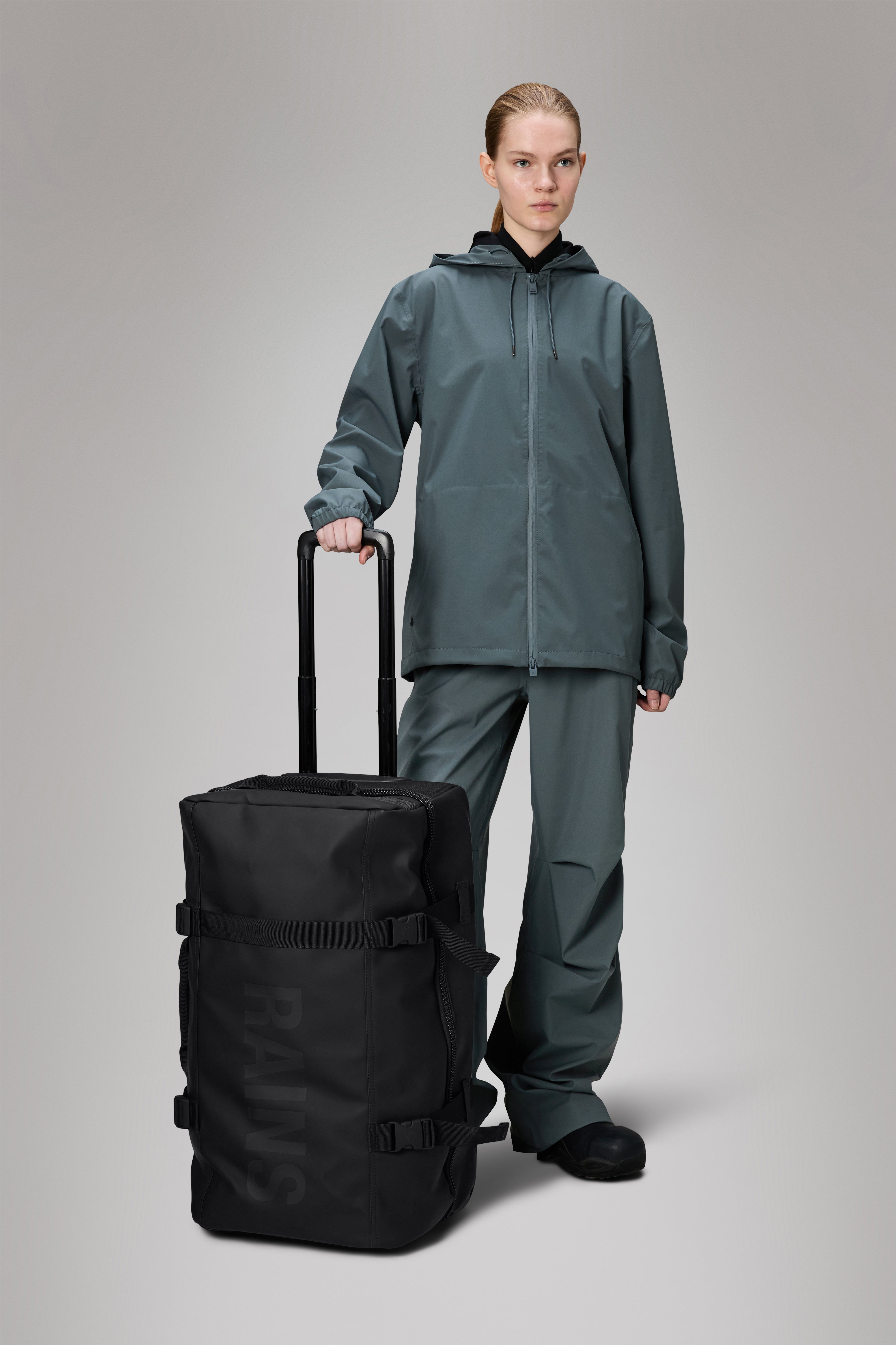 RAINS Texel Check-in Bag Black 62L H66 x D29 x W40 cm Trolley